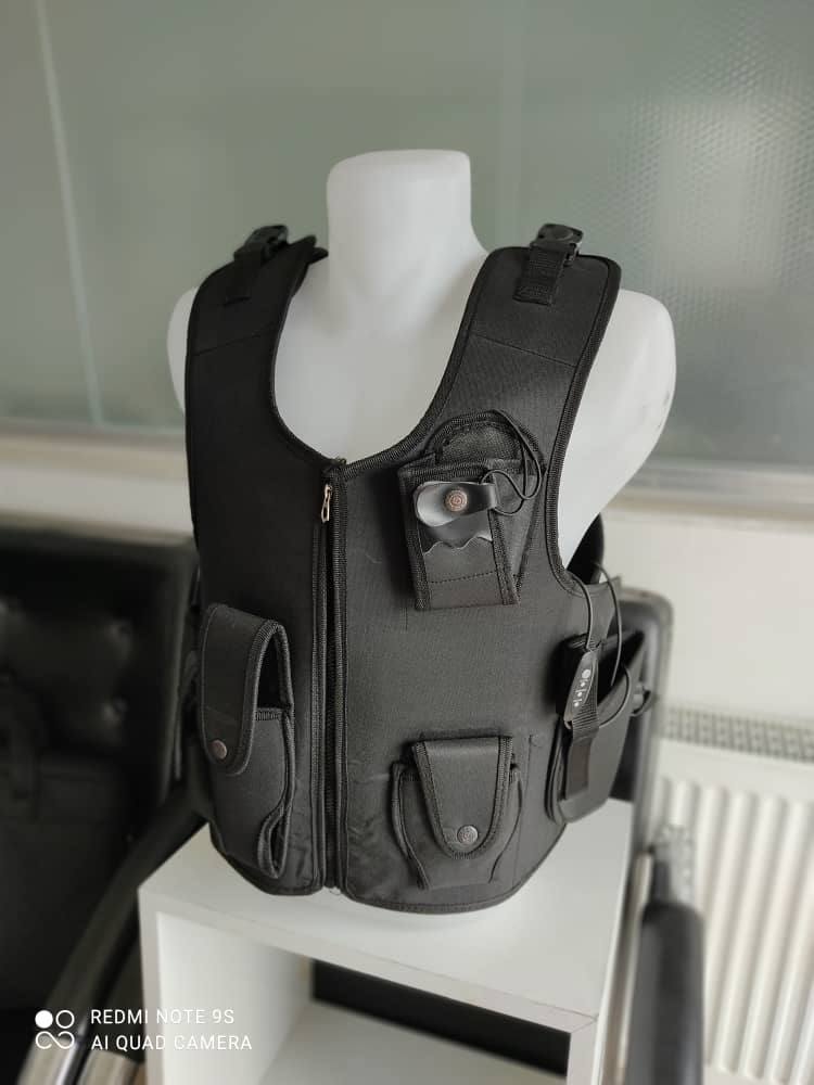 Military vest prototype with heating pad on a mannequin